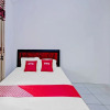 Отель OYO 90543 An-nur Guest House Syariah, фото 20