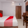 Отель OYO 15442 Mahalakshmi Suites, фото 4