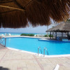 Отель New Beachfront PH at Brisas By The Spot, фото 15