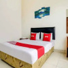 Отель OYO 3898 Sultan Premiere Ayuni Residence, фото 3