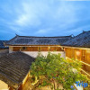 Отель Lijiang Tongxin Garden Inn, фото 1