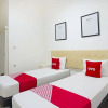 Отель OYO 91508 Ruby Homestay Syariah, фото 16