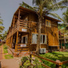 Отель OYO 14146 Home Modern Beach Cottages Morjim, фото 3