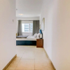 Отель Palatial 2BR Apartment with Sleek Finish, фото 8