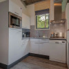 Отель Restyled Bungalow with Dishwasher near Nature Reserve, фото 12