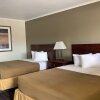 Отель Silver Spur Vintage Inn & Suites, фото 6