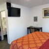 Отель Travis Lodge Motel 16, фото 6