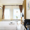 Отель Comfortable Patraland Urbano Studio Apartment Near Train Station, фото 14