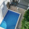 Отель Amazing Home in Podstrana With Outdoor Swimming Pool, Wifi and 5 Bedrooms, фото 13