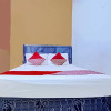 Отель OYO 90476 Iksan Homestay Syariah, фото 7