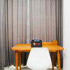 Отель Homey And Simply Studio Room At Enviro Apartment, фото 10
