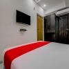 Отель OYO 18542 Petals Inn, фото 6