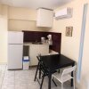 Отель sunmer apartment 1minute from sea, 15 min from the airport, фото 6