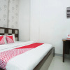 Отель OYO 819 Bumi Mas Guest House, фото 2