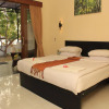 Отель Bumbangku Beach Cottage, фото 1
