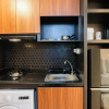 Отель Studio Room Apartment at M-Town Residence near Summarecon Mall Serpong, фото 19