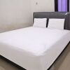 Отель OYO 92938 Kost Putih Syariah, фото 8