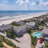 Отель Beachfront Deck With Steps Down to the White Sandy Beach Sea Dunes Sandcastle 1A, фото 20