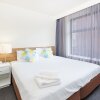 Отель City Edge Serviced Apartments East Melbourne, фото 15