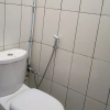Отель Ombai Guest House 27 Syariah RedPartner, фото 8