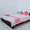 Отель OYO 752 Abz Guest House Syariah, фото 3
