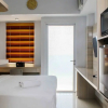 Отель Comfy And Minimalist Studio At Mustika Golf Residence Apartment, фото 14