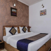 Отель OYO 7655 Om Paradise Hotel, фото 5
