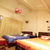 Отель Lijiang Xieyiju Hostel, фото 10