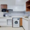 Отель Comfort Living And Homey 1Br Tamansari Bintaro Mansion Apartment, фото 6