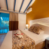 Отель Tropicana Suites, фото 9