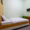 Отель OYO 91731 Home Stay Elis Cateliya Syariah, фото 7