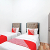 Отель OYO 92946 Dekna Homestay Syariah, фото 4