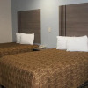 Отель Woodland Inn and Suites, фото 3