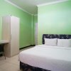 Отель Marzan Syariah Guest House by OYO Rooms, фото 15