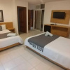 Отель Capital O Hotel Arena Beach Club, фото 4