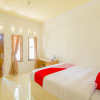 Отель OYO 921 Hotel Ratu Pantai, фото 11