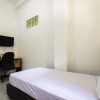 Отель Kost Daya by OYO Rooms, фото 19