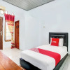 Отель Wisma Amalia Syariah by OYO Rooms, фото 4