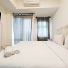 Отель Cozy And High Floor Studio Room At Vida View Makassar Apartment, фото 8