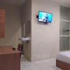 Отель RedDoorz At Kartini Residence Semarang, фото 18