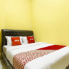 Отель OYO 90900 Pagi Sore Residence, фото 3
