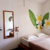 Отель Snooze Guesthouse Yogyakarta - Hostel, фото 1