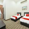 Отель Super OYO Capital O 90434 Marmoris House, фото 4