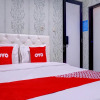 Отель OYO 582 Wisma Bungur Syariah, фото 4