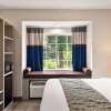 Отель Microtel Inn & Suites by Wyndham Florence/Cincinnati Airport, фото 5