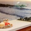 Отель Luxury, Water views & Beach 100m - The Beach Nest, фото 8