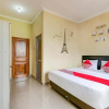 Отель SUPER OYO 90905 Dangau Datuk Guesthouse, фото 2