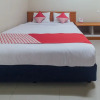 Отель OYO 1448 Mangga Dua Guest House, фото 19