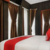 Отель OYO 444 Rafitha Homestay, фото 13