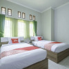 Отель Wisma Teratai by OYO Rooms, фото 6
